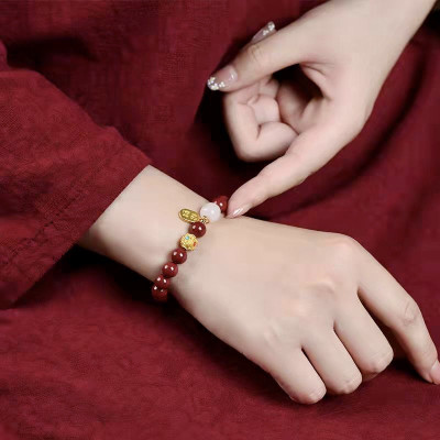 VÒNG TAY CHUỖI HẠT ĐÁ ĐỎ BÌNH AN , TÀI LỘC