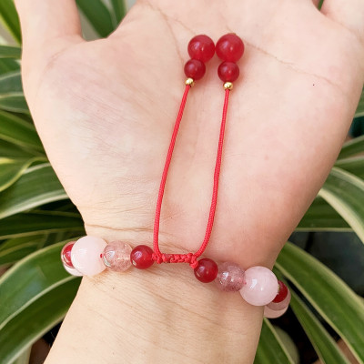 Vòng tay phong thủy đá thạch anh thiên nhiên kết dây thủ công