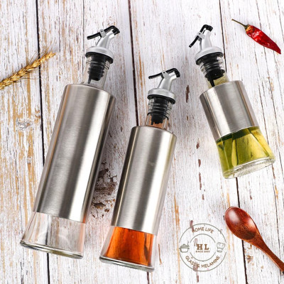 Bình thủy tinh bọc inox đựng dầu ăn, giấm, nước tương, nước mắm, gia vị... có vòi chiết rót thông minh hạn chế quá tay
