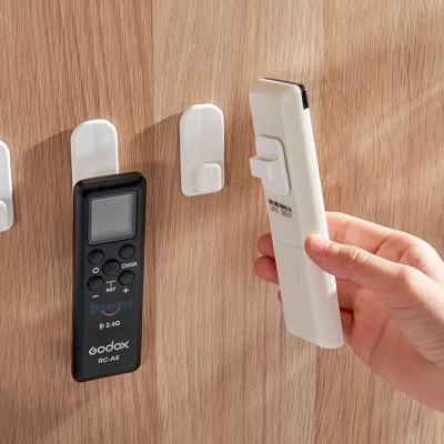 Vỉ 2 Móc Treo Điều Khiển Điều Hoà TV Remote Máy Lạnh Đa Năng Dán Tường Dạng Gài Tiện Lợi