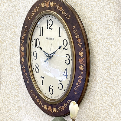 Đồng hồ treo tường Nhật Bản Rhythm CMG298nr06 – Kích thước 47.5 x 60.5 x 4.5cm. Dùng PIN.