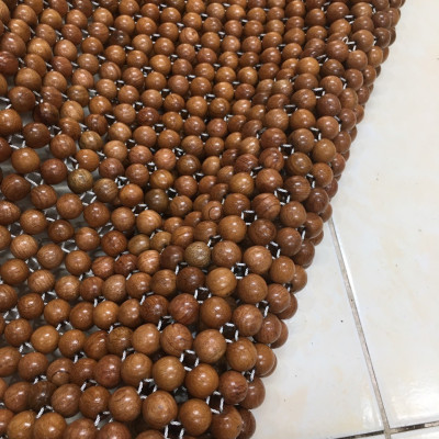 Đệm lót ghế văn phòng bằng hạt gỗ thoáng mát