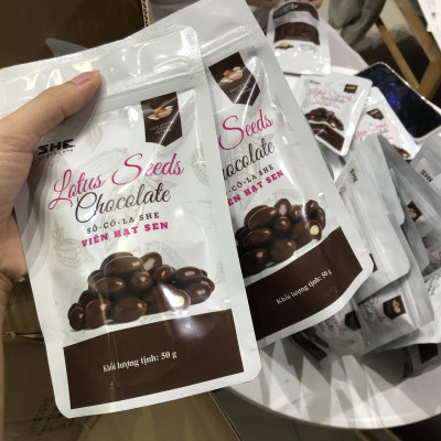 Socola viên Hạt sen - túi 50g -SHE Chocolate - Bổ sung năng lượng, đa dạng vị giác. Quà tặng sức khỏe, quà tặng người thân, dịp lễ, thích hợp ăn vặt