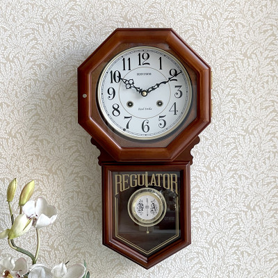 Đồng hồ treo tường Nhật Bản Rhythm CMJ586NR06 dùng pin, kích thước 24.0 x 54.0 x 11.7cm, vỏ gỗ, điểm giờ bằng gong.