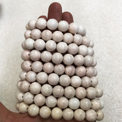 Vòng tay chuỗi hạt ngọc canxidene màu hồng phấn 16 li đá tự nhiên của Việt Nam vongtaychuoihat16li