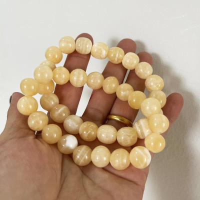 Vòng tay chuỗi hạt ngọc thật màu vàng cam cho người mệnh Thổ và hỏa đường kính hột 10 li (1cm)