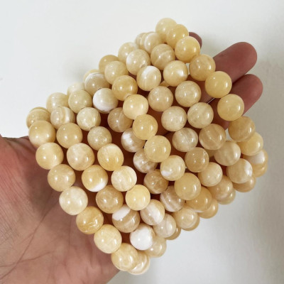 Vòng tay chuỗi hạt ngọc thật màu vàng cam cho người mệnh Thổ và hỏa đường kính hột 10 li (1cm)