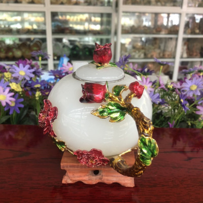 Bộ ấm trà chạm bông hoa mẫu đơn đá bạch ngọc