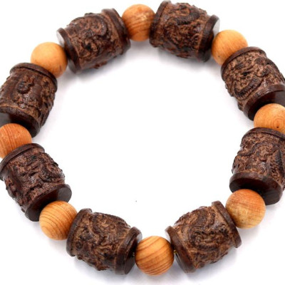 Vòng tay chuỗi hạt trụ rồng gỗ đàn hương TRNM5