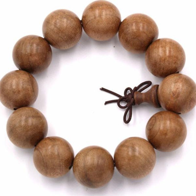 Vòng tay chuỗi hạt gỗ Thủy tùng vàng 20 ly